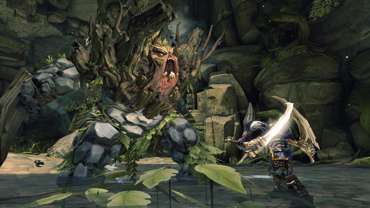 In-game screenshot of Darksiders 2 during combat scene against monster