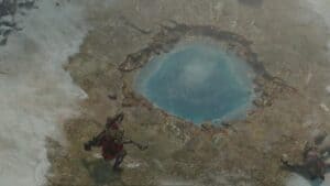 diablo 4 hot spring on stone and snow with player standing near