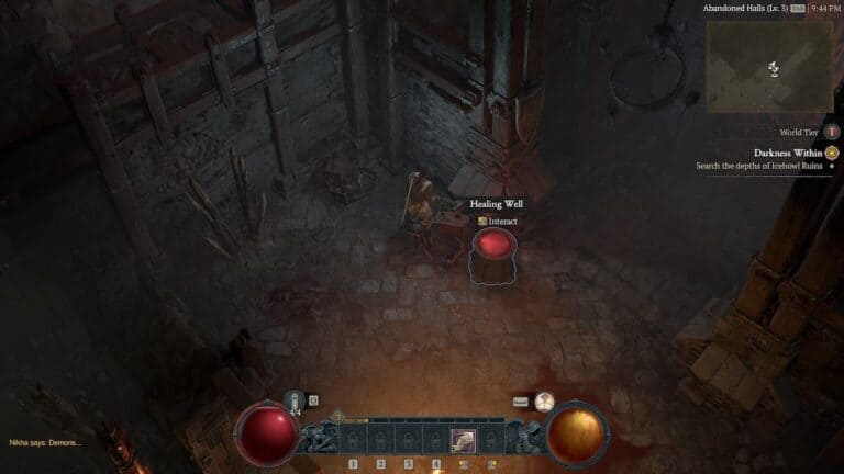diablo 4 player stands near healing well in dingy dungeon with crates