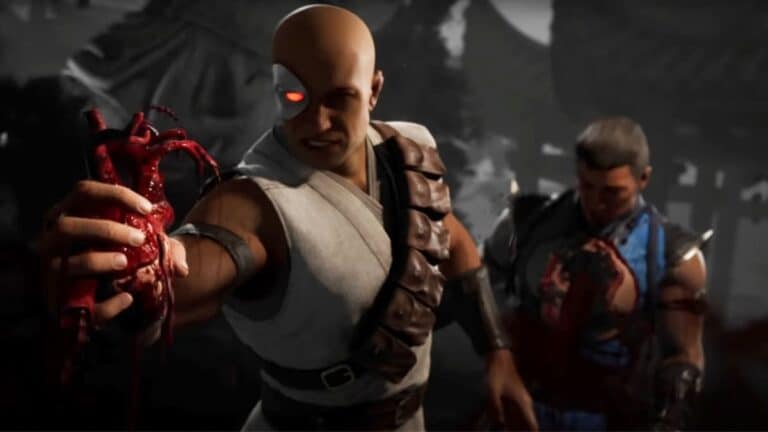 mortal kombat 1 man in white holds ripped out heart of opponent