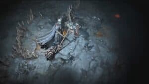 diablo 4 tomb lord boss with staff weapon and skeletons stand in dark cave