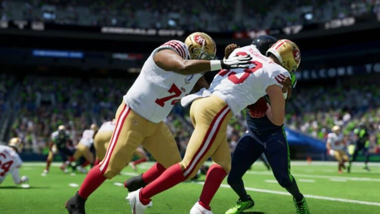 Madden 24 Player With Ball Getting Tackled