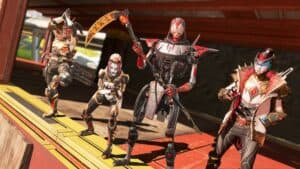 apex legends revenant and other legends in red and gold pose on ledge in crate
