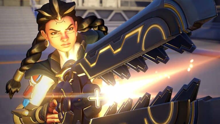 overwatch 2 illari close up charges glowing gun and points while looking determined