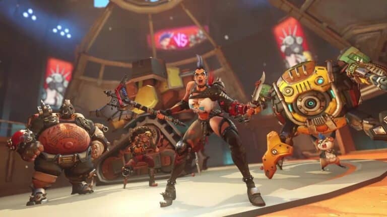 overwatch 2 junker queen roadhog junkrat and wrecking ball pose in junkertown