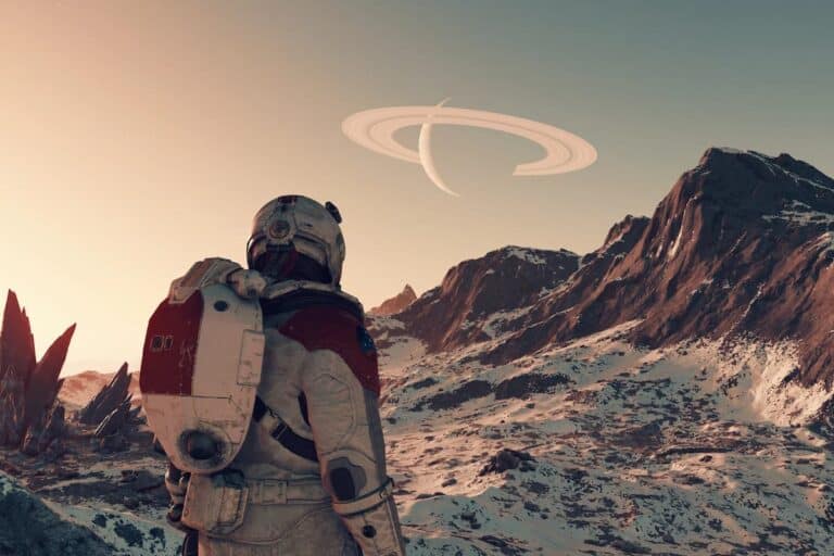 starfield astronaut stands on snowy mountain planet with red rocks and ringed planet in sky