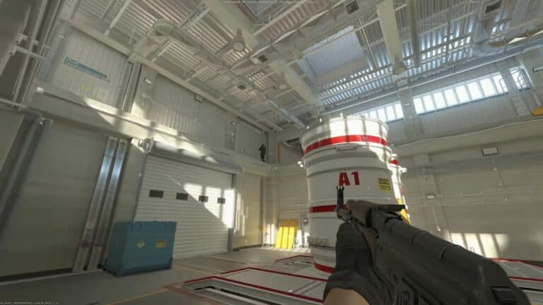 cs2 first person view holding gun walking in large garage with tank A1 label at daytime