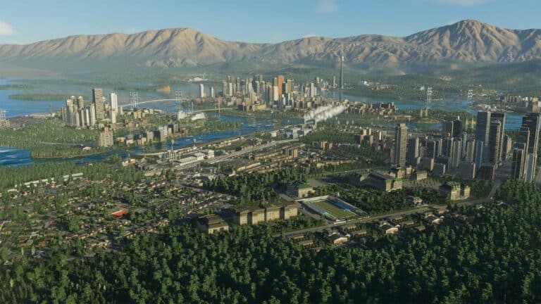 Cities Skylines 2 Overview of City With Mountains In Background